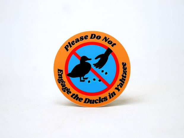 Please Do Not Engage The Ducks In Yahtzee Laptop Sticker: Header tags w/ cellophane baggies