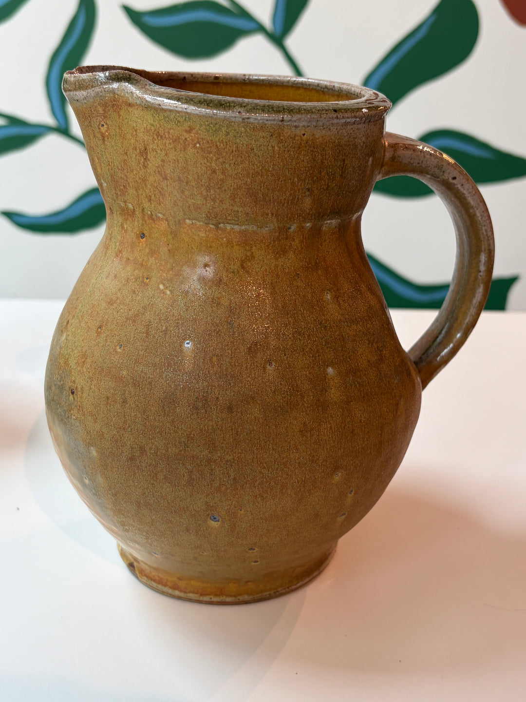 Earthy Glazed Ceramic Pitcher
