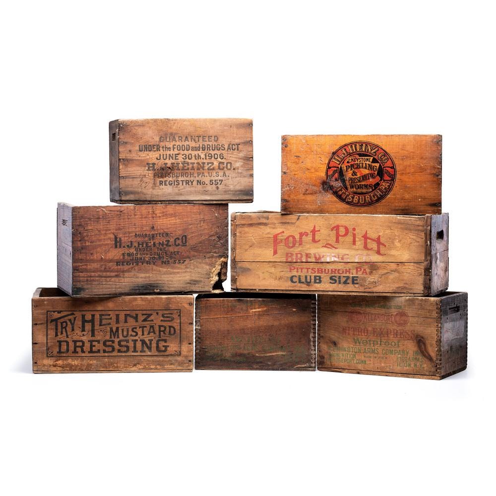 Six Advertising Storage Crates